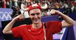 Axelsen retains badminton crown; An claims women's gold