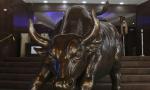 Sensex closes higher 410 pts in volatile trade