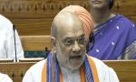 Marshals cordon Amit Shah in LS as Oppn protest turns ugly