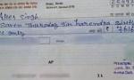 Teacher suspended after picture of cheque with spelling errors goes viral