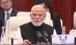 Modi slams 'support to terrorism' in Pak PM's presence