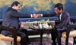 Praggnanandhaa plays chess with Gautam Adani