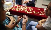 IMAGES: Shoppers rush for gold as price crashes