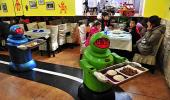 IMAGES: A restaurant where robots cook and serve food