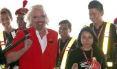 IMAGES: 'Stewardess' Richard Branson fired by AirAsia chief