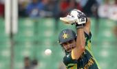 PHOTOS: Akmal ton takes Pak past Afghans with bonus point