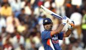 Dhoni's century sets up big win for India