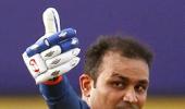 Sehwag's ton helps India storm into final