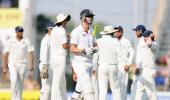 England keep India's desperate victory attempts at bay