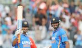 Dhoni happy being a 'punching bag'