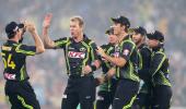 PHOTOS: Wade, Hussey fire Australia to win over India