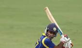 Jayawardene, Umesh steer Delhi into play-offs