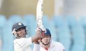 Pujara props India with second successive hundred