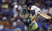 Late assault by Kamran, Shoaib Malik flattens India