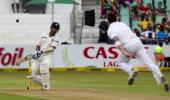 PHOTOS: Morkel removes Dhawan; Vijay, Pujara steady India