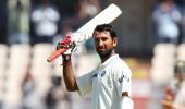 PHOTOS: Pujara's double ton flattens Australia on Day 3