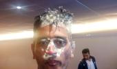 Birthday boy Dhoni under cake-attack!