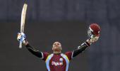 Samuels fires hundred as crisis-hit Windies stun World champs India