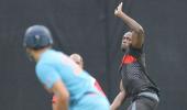 Thunder 'Bolt' hits Bangalore... with cricket bat and ball