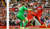 Multi-faceted Benteke impresses on Liverpool debut with all-round play