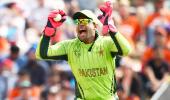 The strange case of Umar Akmal's gloves!