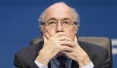 What prompted outgoing FIFA chief Blatter to quit?