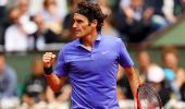 New racquet-wielding Federer says never felt better before Wimbledon