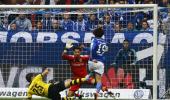 Dortmund twice squander lead in draw at Schalke