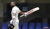 PHOTOS: Kohli makes history as India take command