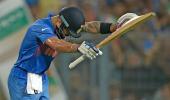 PHOTOS: Kohli bows before 'God of cricket'