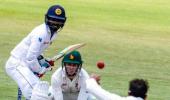 Karunaratne century gives Sri Lanka huge lead