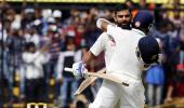 Kohli's 211 and Rahane's 188 propels India to a huge total