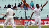 PHOTOS: Pujara, rain thwart Sri Lanka's charge on Day 2