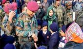 PICS: Lt Co. Dhoni's surprise visit to Army Public School in Srinagar