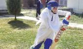 Kashmir's women cricketers pitch for equality -- in burqas and hijabs