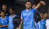 PIX: Dhoni takes to the football field