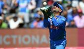 Twin world records for Dhoni in India's T20 win