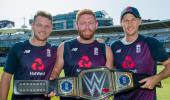 PIX: England team receives WWE championship title