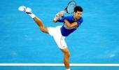 PHOTOS: Djokovic through to semis after Nishikori retires