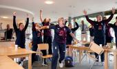 England women's team congratulate Morgan & Co