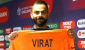 Captain Kohli gives thumbs-up to new orange jersey