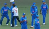 Run for a hug: Fan breaks security to embrace Dhoni