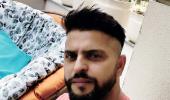 Suresh Raina gets a haircut from wife Priyanka