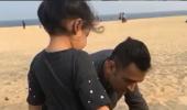 PIX: When Dhoni plays doting dad