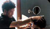 SEE: Sachin gives son Arjun a haircut