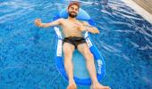 PIX: Kohli chills in the pool