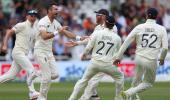 PIX: Anderson rallies England on rain-hit Day 2