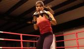 Boxer Zareen stuns world champ to enter quarters