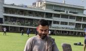 PICS: Kohli meets a cool cat during net practice