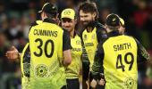 Aus survive Rashid scare to keep semis hopes alive